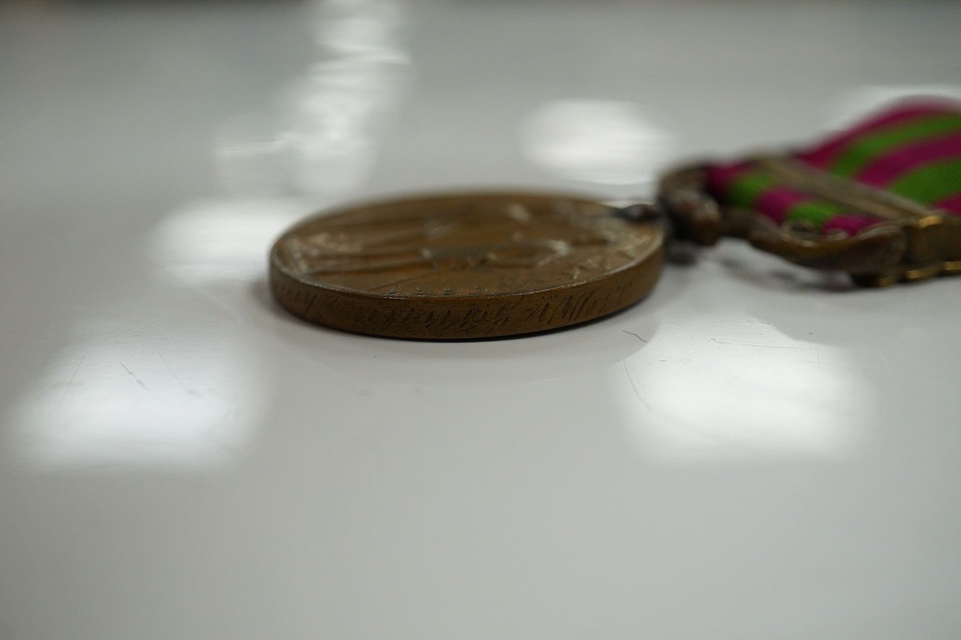 Two India Medals; one with Tirah 1897-98 clasp, naming worn/erased, the other in bronze with Punjab Frontier 1897-98 clasp to ...Transport Dept